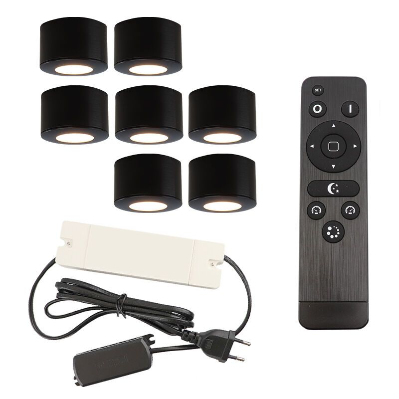 7 okrągłe oprawy natynkowe czarne na werandy Vasso, IP44, z zestawem przyłączeniowym i pilotem