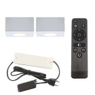 2 kwadratowe oprawy natynkowe białe na werandy Fredo, IP44, z zestawem przyłączeniowym i pilotem